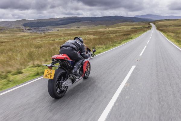 The Honda RC213V-S being ridden on a Welsh road